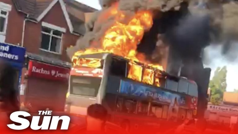 Double-decker bus bursts into flames as passengers flee in suspected arson attack